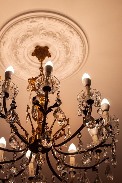 Hand-selected crystal chandelier in the Deluxe Double Room